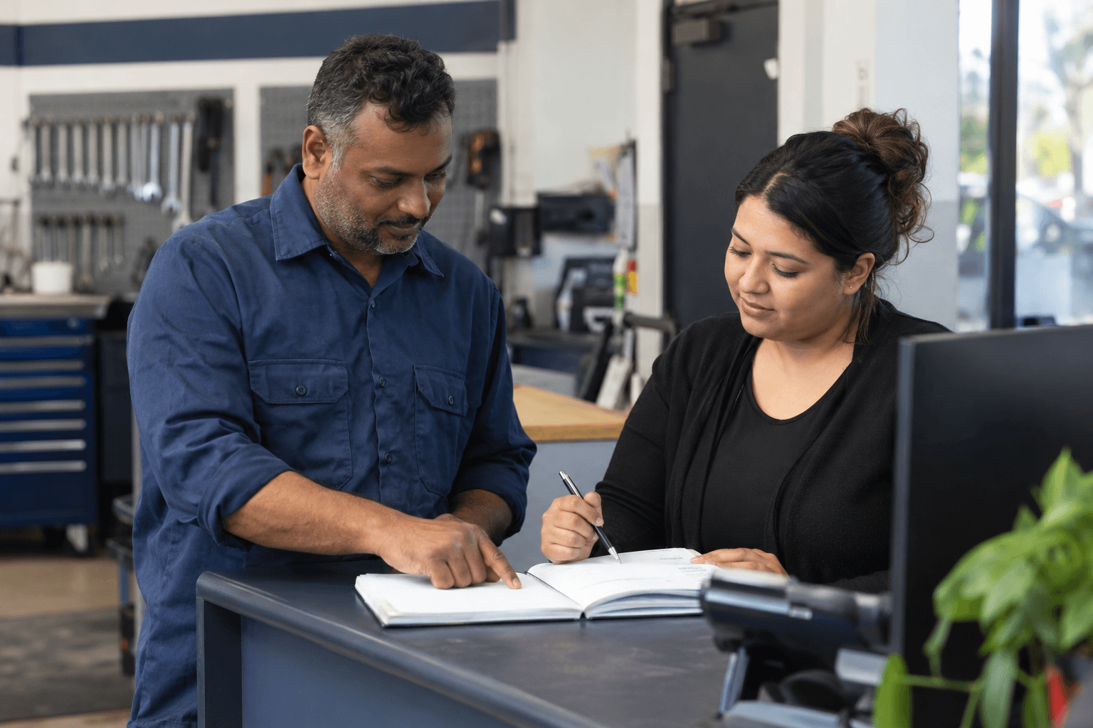 Residential service professionals coordinating customer work